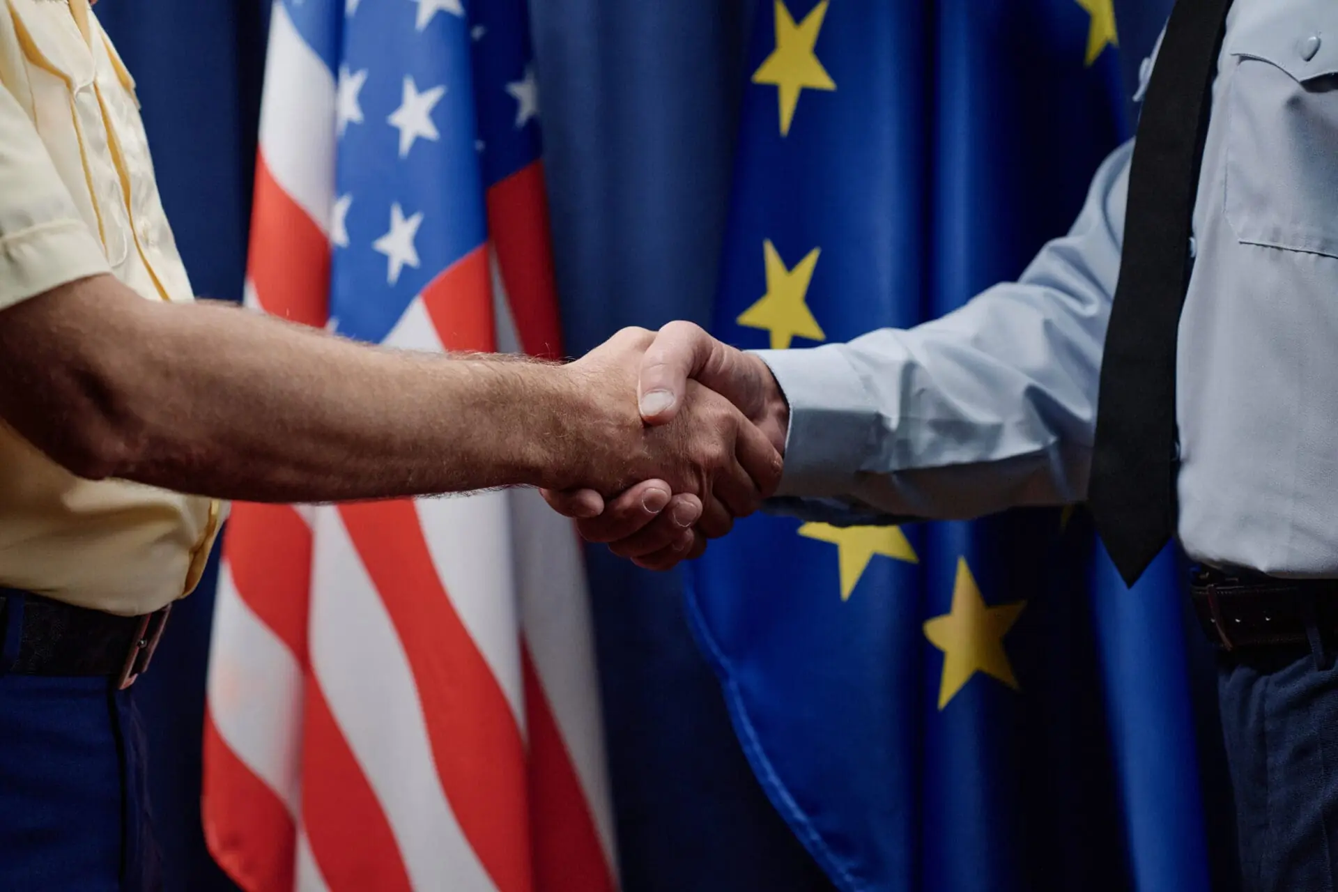 Close-up of politicians concluding a contract during international conference