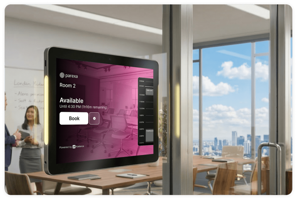 Kadence Room Display tablet mounted outside a meeting room showing live availability, time remaining, and a one-tap Book button, powered by Kadence.